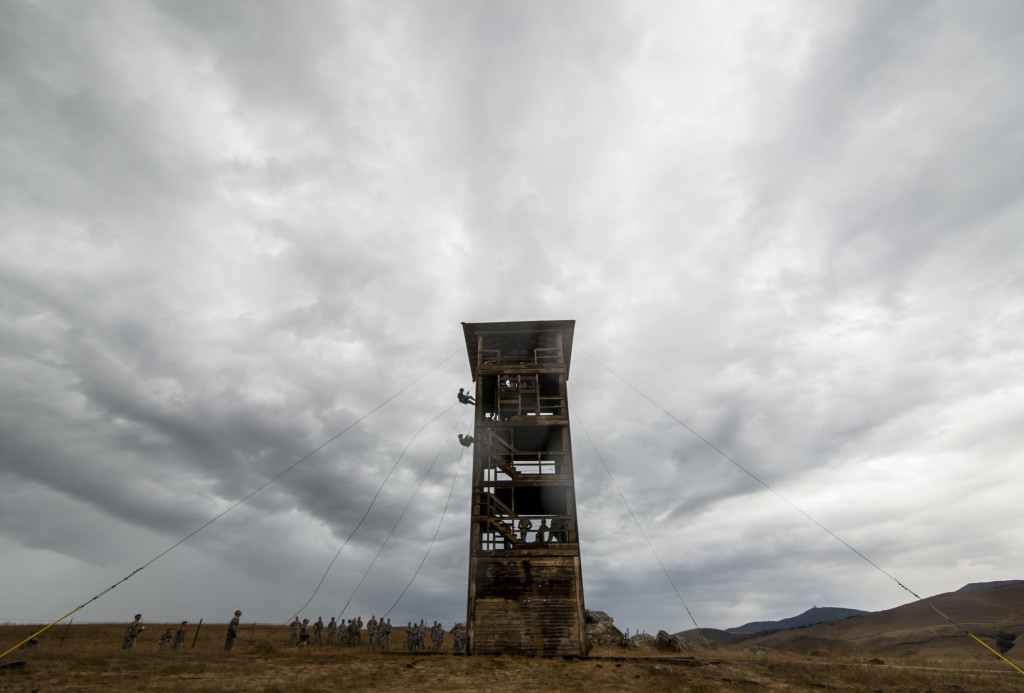 U.S. Army Reserve combat engineer Soldiers from the 374th Engineer Company (Sapper), headquartered in Concord, Calif., conduct a rappel training from a 100-foot tower, July 19, during a two-week field exercise known as a Sapper Leader Course Prerequisite Training at Camp San Luis Obispo Military Installation, Calif. The class was taught by three rappel masters from a Special Operations Response Team for the U.S. Department of Justice. The combat engineer company is grading its Soldiers on various events to determine which ones will earn a spot on a "merit list" to attend the Sapper Leader Course at Fort Leonard Wood, Mo. (U.S. Army photo by Master Sgt. Michel Sauret)