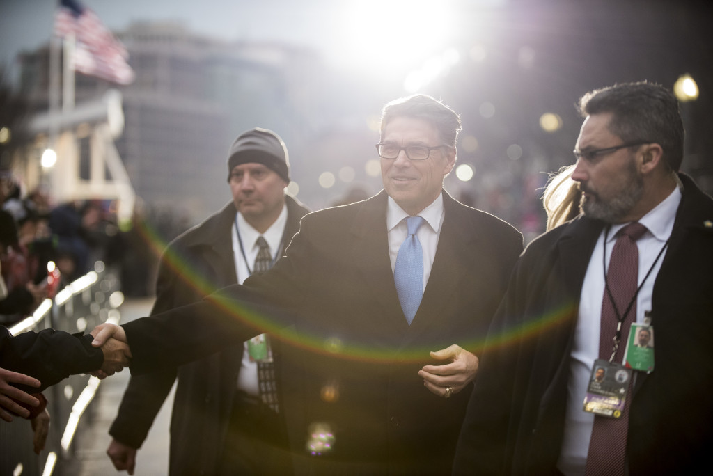 Former Texas Governor Rick Perry shakes hands with members of the crowd during the 58th Presidential Inauguration Parade in Washington, D.C., on Jan. 20. The parade route stretched approximately 1.5 miles along Pennsylvania Avenue from the U.S. Capitol to the White House. (U.S. Army Reserve photo by Master Sgt. Michel Sauret)