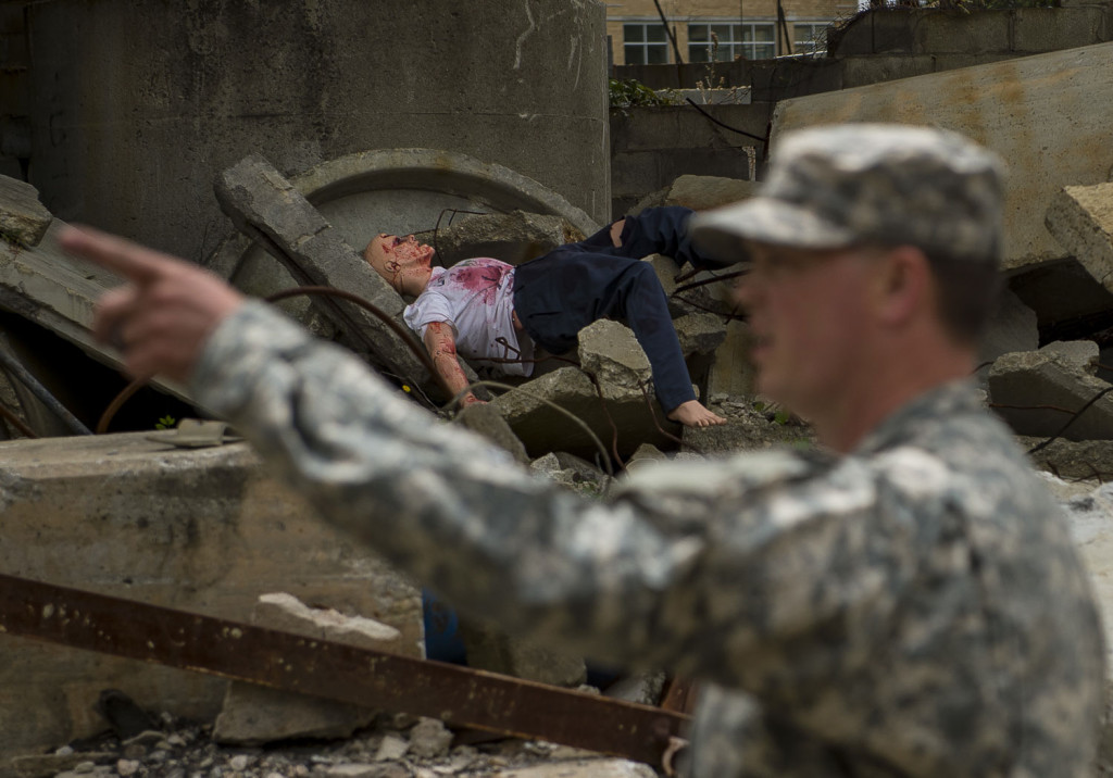 A mannequin lies in the rubble of a training site during Guardian Response 17 at the Muscatatuck Urban Training Center, Indiana, April 27, 2017. Guardian Response, as part of Vibrant Response, is a multi-component training exercise run by the U.S. Army Reserve designed to validate nearly 4,000 service members in Defense Support of Civil Authorities (DSCA) in the event of a Chemical, Biological, Radiological and Nuclear (CBRN) catastrophe. This year's exercise simulated an improvised nuclear device explosion with a source region electromagnetic pulse (SREMP) out to more than 4 miles. The 84th Training Command is the hosting organization for this exercise, with the training operations run by the 78th Training Division, headquartered in Fort Dix, New Jersey. (U.S. Army Reserve photo by Master Sgt. Michel Sauret)